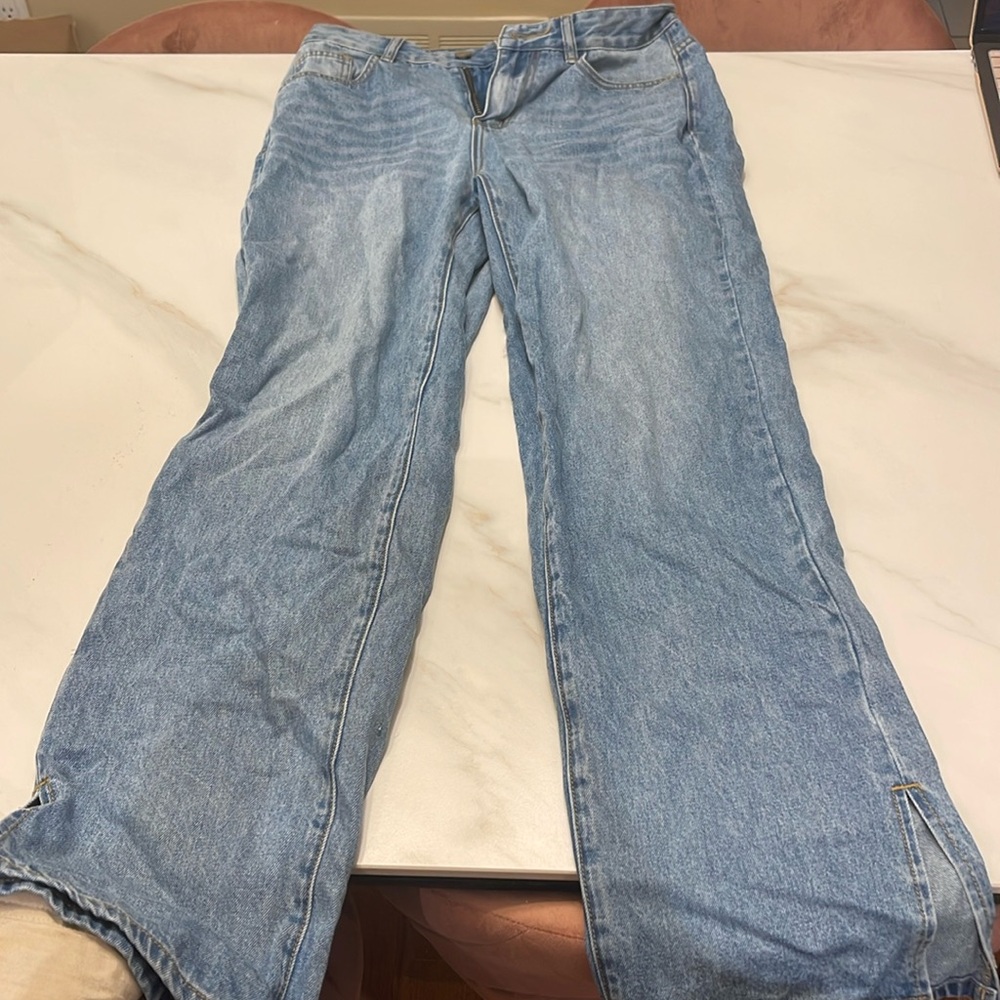 Never worn jeans with cut outs